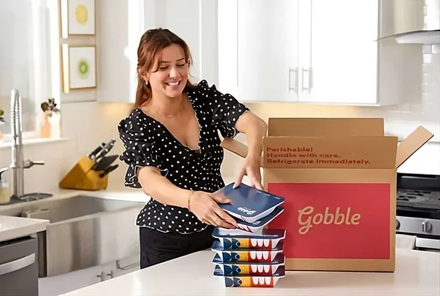 Gobble prepared meals woman in kitchen